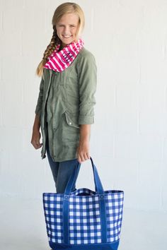 "Monogrammed Tote Bag OR Toiletry Bag Travel in style with this monogrammed tote bag in stunning blue gingham pattern. Order it with a name or add a monogram in your choice of font and thread color. Tote Features: 21\" L x 7\" W x 14\" H Polyester Inside Zipper Pocket Duffel Features: 21\" L x 10\" W x 14\" H Polyester Interior Lining Exterior and Interior Zipper Pocket Dual Zipper Closure Adjustable/Removable Shoulder Strap Reinforced Bottom with Rubber Feet Easy-to-Carry Handles Toiletry Featu Preppy Blue Everyday Bag, Preppy Blue Bag For Everyday Use, Preppy Blue Bags For Everyday Use, Gingham Bag, Monogrammed Rain Jacket, Bridesmaid Tote Bags, Mint And Navy, Rain Jacket Women, Monogram Tote Bags