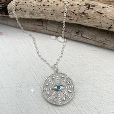 Calling all fashionistas! Our Evil Eye Lucky Charm Necklace features the evil eye surrounded by other good luck talismans. This modern interpretation of a long-standing mythical symbol is embellished with tiny cz stones and a turquoise blue eye stone in a high-quality gold or silver plated finish. Charm measures 1 inch. What's the history behind it? The meaning dates back almost 3,000 years to ancient Greece and Rome. Wearing an evil eye as an amulet is believed to provide protection against ev Lucky Charm Necklace, Eye Symbol, Symbol Necklace, Rose Gold Chain, Blue Eye, Eye Stone, Ancient Greece, Initial Charm, Love Ring