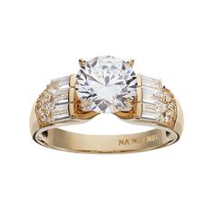 an 18k gold ring with baguettes and diamonds