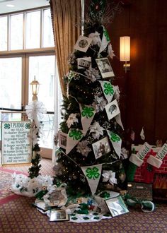 a christmas tree decorated with pictures and decorations