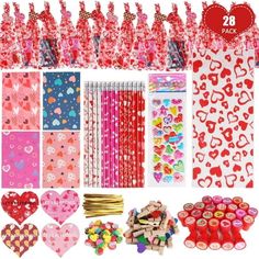 valentine's day party supplies including hearts, lollipops and candy sticks