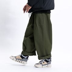 Baggy Cotton Cargo Pants For Spring, Non-stretch Cotton Cargo Pants For Streetwear, Spring Streetwear Chinos With Tapered Leg, Spring Streetwear Tapered Leg Chinos, Spring Tapered Leg Chinos For Streetwear, Straight Leg Chinos For Spring Streetwear, Spring Streetwear Straight Leg Chinos, Spring Straight Leg Chinos For Streetwear, Casual High Waist Parachute Pants For Winter