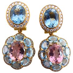 Thomas Leyser is renowned for his contemporary jewellery designs utilizing fine gemstones. This 18k rose gold (17.52g) pair of earrings is set with 2x fine pink Tourmalines (facetted, oval, 10x8mm, 4.84ct) + 16x Aquamarines (facetted, oval, 5x4mm, 4.53ct) + 96 Diamonds (brillant-cut, 1 - 1,4mm, G(VS), 0,50ct. The clip has a tool at the backside for the use of a separat hanger. Pink Diamond Earrings, Contemporary Jewelry Design, Gold Ring Designs, Tourmaline Jewelry, Women Diamond, Contemporary Jewellery, Gorgeous Jewelry, Bridal Jewelry Sets, Jewellery Designs