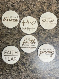 six stickers with the words faith, hope, and love on them sitting on a granite countertop