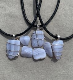 These blue lace agate necklace are meticulously crafted to showcase the natural beauty and uniqueness of the stone, making it a truly one-of-a-kind accessory. The minimalistic design adds a touch of sophistication to any outfit, while the varying shades and patterns of the blue lace agate ensure that each necklace is a unique work of art. Please note that due to the natural variations in the stone, the necklace you receive may vary slightly from the photograph, adding to its charm and individual Blue Lace Agate Necklace, Peaceful Meditation, Crystal Necklaces, Calming Stones, Unique Necklace, Agate Necklace, Blue Lace Agate, Minimalistic Design, Thoughts And Feelings