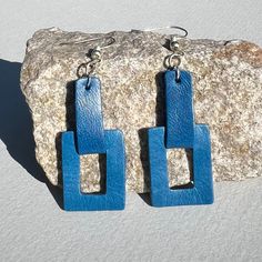 These colorful earrings are great for pairing with your vibrant summer outfits. They're ultra-lightweight due to being crafted with reclaimed leather, sourced from discarded samples from High Point furniture stores. Our Afghan artisans lovingly handcraft each earring from the comfort of their homes. Handmade Blue Leather Earrings, Modern Blue Leather Jewelry, Everyday Blue Leather Jewelry, Modern Blue Everyday Earrings, Modern Blue Earrings For Everyday, Modern Blue Earrings For Everyday Wear, Artisan Blue Leather Jewelry, Vibrant Summer Outfits, 31 Bags