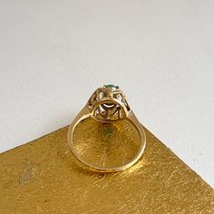 Estate/ vintage 14KT yellow gold oval, genuine emerald band ring. Super unique solitaire ring with an artistic, wavy double gold band setting. Size 9 Can be resized for an additional fee .75 carat medium green color oval emerald 7 mm x 6.75 mm Inclusions which is typical of a natural emerald Weight: 2.5 grams Mid century design Excellent Estate Condition Clearly Antique Style Emerald Band Ring, Emerald Band, Natural Emerald, Emerald Ring, Gold Band, Mid Century Design, Antique Style, Solitaire Ring, Gold Bands