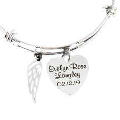 "Personalized Memorial Bracelet, Memorial Gift, Sympathy Gift for Her, Remembrance Jewelry, Loss of Loved One, Silver Angel Wing Bracelet This is laser engraved into high quality heavy gauge stainless steel. Each Heart Pendant Measures approx. 7/8\" Details for Bracelet: * Stainless Steel Bangle * ONE - 7/8\" Stainless Steel Round Disc with Name & Date or wording of your choice * Silver Angel Wing Other metal color options can be chosen ( Silver, Gold, Rose Gold) How to order: 1. Add this it Adjustable Heart Charm Jewelry Keepsake, Adjustable Engraved Heart Bracelet Gift, Adjustable Stainless Steel Keepsake Jewelry, Silver Engraved Bracelet For Memorials, Engraved Silver Bracelet For Memorial, Memorial Engraved Silver Bracelets, Spiritual Heart Bracelet For Valentine's Day Gift, Silver Engraved Bracelet For Memorial, Symbolic Personalized Bracelets As Gifts