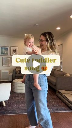 a woman holding a baby in her arms with the words cute todder song on it