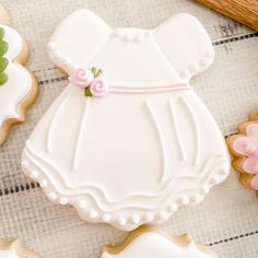 decorated cookies are arranged on a table