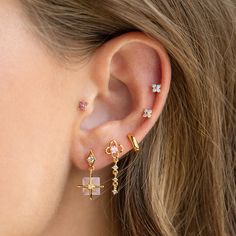 Love all things teeny tiny and colorful? Then you need to add our Beautiful Blossom Stud Set to your cart! This versatile earring set includes five dazzling cluster studs. The styling options are endless! 18k gold plated, 18k rose gold plated, or rhodium plated over brass with a protective coating Cubic zirconia stones Sterling silver posts and butterfly backings Includes 5 mismatched studs 4mm stud diameter Shop the entire Blossom Collection here Minimal Earrings, Necklace Chain Lengths, Stud Set, Pin Jewelry, Flower Earrings Studs, Small Earrings, Everyday Earrings, Flower Studs, Copper Earrings