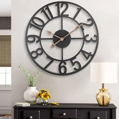 PRICES MAY VARY. Create a Focal Point - A large wall clock placed in a prominent, living room location makes it easy to tell what time it is. Our large wall clock also draws attention and becomes the standout or focal point of the indoor and outdoor space. Keep Good Time - Battery-operated wall clocks don’t come with any power cord and don’t need to be hung next to an outlet. Moreover, this large wall clock is battery operated by a 1 x AA battery(not included), so it will keep on running even wh Huge Wall Clock, Wall Clock Decor Living Room, Large Metal Wall Clock, Outdoor Wall Clocks, Wall Clock Decor, Gold Wall Clock, Farmhouse Clocks, Clock For Living Room, Led Wall Clock