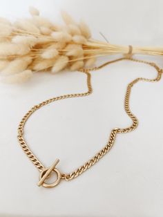 This is a thing gold chain necklace that can either be worn very long or wrapped around twice to be a shorter double chain. Attaches by a toggle. Double Chain, Gold Chain Necklace, A Thing, Gold Chain, Gold Chains, Chain Necklace, Chain, Gold