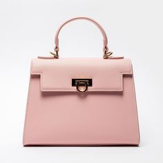 Versatile Top Handle Bag in Pink Luxury Pink Top Handle Bucket Bag, Luxury Pink Bucket Bag With Top Carry Handle, Luxury Pink Bucket Bag For Shopping, Luxury Pink Bag For Daily Use, Classic Pink Rectangular Bag, Luxury Pink Bucket Bag With Removable Pouch, Luxury Pink Shoulder Bucket Bag, Luxury Pink Shoulder Bag, Luxury Pink Double Handle Bucket Bag