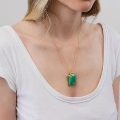 This Chrysoprase rectangular necklace is a brilliant, vivid apple green color that will give a splash of color to any outfit. This lovely green pendant is made of 925 sterling silver and is said to activate the heart chakra. The cabochon pendant of chrysoprase promotes flexibility and self-acceptance. For good luck, Alexander the Great carried it on his belt. Stone Origin: Australia Measures Approximately: 27 x 25 mm Materials: 925 Sterling Silver with 14k Yellow Gold Vermeil finish and Gold Fill chain Please Note: If you would like to purchase a different chain please purchase pendant only and click here. All pieces shipped within 48 hours from our Del Mar Gallery. Apple Green Color, Chrysoprase Necklace, Green Pendant, Green Pendants, For Good Luck, Alexander The Great, Birthstone Gifts, Cabochon Pendant, Mens Pendant