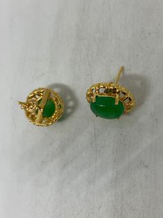 Delicate and detailed nephrite Jade and stone and white bronze gold rhodium earrings Chinese letter for luck These earrings are about an inch long All jewelry is shipped in a nice gift box. Check out our over a THOUSAND great reviews Gold Clip-on Earrings With Gemstone, Green Gold Plated Round Earrings, Green Gold-plated Round Earrings, Green Round Gold-plated Earrings, Green Gold Plated Earrings Fine Jewelry, Yellow Gold Jade Earrings For Anniversary, Jade Drop Earrings For Anniversary, Green Gold-plated Earrings, Green Gold-plated Pierced Earrings