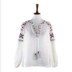 Belle Vere White Embroidered V-Neck Blouse, New With Tags Approximate Measurements: Pit To Pit 20" X Length 22” Condition: New With Tags Made In: China Inventory: Wt4413.5.5 Summer Embroidered V-neck Peasant Top, V-neck Blouse With Multicolor Embroidery For Vacation, Embroidered V-neck Peasant Top For Beach, Multicolor Floral Embroidered V-neck Top, Floral Embroidered V-neck Blouse For Vacation, Summer V-neck Top With Geometric Embroidery, V-neck Embroidered Blouse For Vacation, Bohemian V-neck Blouse With Multicolor Embroidery, Multicolor Embroidered V-neck Top For Vacation