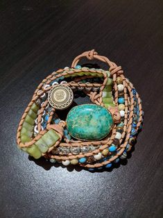 Spiritual Turquoise Round Crystal Bracelet, Handmade Turquoise Leather Bracelet Spiritual, Turquoise Hand-wrapped Jewelry For Meditation, Turquoise Hand-strung Healing Bracelets, Hippie Turquoise Hand-strung Bracelets, Natural Turquoise Stone, Jasper Bracelet, Crystal Healing Bracelets, Leather Wrap Bracelet