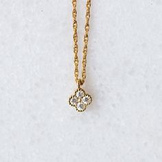 Diamond Pendant With Flower Charm, Elegant Gold Necklaces With Cross Pendant, Elegant Gold Cross Pendant Necklaces, Yellow Gold Charm Necklaces With Cubic Zirconia, Yellow Gold Cubic Zirconia Charm Necklace, Tarnish Resistant, Classic Gold Jewelry With Flower Charm, Fine Jewelry Gold Square Pendant, Gold Fine Jewelry With Square Pendant, Elegant Oval Pendant Necklaces With Flower Charm