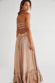 Crinkly strapless maxi dress, made from our sheer and gauzy free-est fabric, with a stretchy smocked bodice, halter neck tie, and low strappy back. Raw seam detailing on the hem. Throw on top of a bikini or layer over one of our seamless styles for an effortless look. | Extratropical Maxi Dress by free-est at Free People in Tan, Size: L Boho Formal Dress, Floral Dress Designs, Western Blouses, Senior Pictures Dresses, Outfits For Spain, Engagement Photo Dress, Blouses Designs, Collection Ideas, Family Picture Outfits