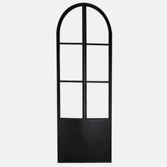 a tall black metal door with an arched glass window on the top and bottom half