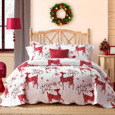 a christmas themed bed in a bedroom