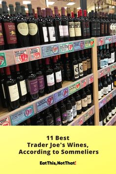 there are many bottles of wine on the shelves in this store and one is labeled 11 best trader joe's wines according to sommeers