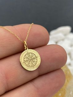 "Compass Necklace in 14k Solid Gold, Delicate Pendant, Gift for Women, Gold Jewelry, Travel Inspiration, Layering Necklace 14k Solid Gold Choose What Size You Want the Pendant Using The First Option Box Choose If you Want Thinner, Thicker  Or Without Chain Using The Second Option Box Photos Are For The 0.5 inch Diameter Pendant Pendant thickness : 0.5mm  Contact us if you want it thicker Inner diameter of jump ring : 4mm Contact us if you need it bigger              No1 chain width : 0.87mm                 No2 chain width : 1.30mm     ♥  Material of pendant and chain: Solid Gold k14  ♥  Packaging: All of our jewelry are beautifully boxed and ready for gifting For more personalized designs take a look here: ♥ www.etsy.com/listing/736955132 ♥ www.etsy.com/listing/819494857 ♥ www.etsy.com/lis Spiritual Round Charm Necklace In 14k Gold, Spiritual Round 14k Gold Charm Necklaces, Spiritual 14k Gold Round Charm Necklaces, Gold Necklace With Compass Design For Anniversary, Dainty Yellow Gold Medallion Jewelry, Gold Anniversary Necklace With Compass Design, 14k Gold Necklace With Round Pendant, Anniversary Gold Necklace With Compass Design, Spiritual 14k Gold Charm Necklaces With Coin Pendant