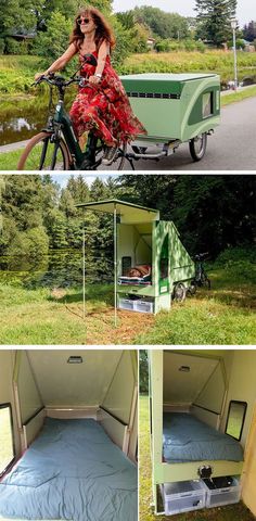 a woman riding a bike next to a green trailer with a bed in the back