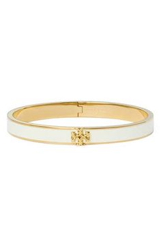 Add some of Tory's signature sophistication to your wrist stack with this enameled hinge bracelet clasped with iconic T-logo hardware. 3/8" width, 6 1/2" inner circumference Goldtone or silvertone plate/enamel Imported Hinge Bracelet, Wrist Stack, Wrist Stacks, Tory Burch Kira, Hinged Bracelet, Bracelet Clasps, Womens Jewelry Bracelets, Hinges, Tory Burch