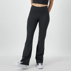 Cut to a mid-rise this pair of Champion women's pants are made from soft recycled fabric with stretch for added comfort. They have a smooth elastic-waistband with slim fitting flare legs. Wear them with a sports bra and grippy socks to move into yoga poses.Front Style: Flat FrontFeatures: Comfort WaistbandClosure Type: Full ElasticFit: Slim FitRise: Mid RiseFiber Content: 78% Recycled Polyester, 22% SpandexFabric Description: WovenInseam: 31 1/2 InLeg Style: Flare LegCare: Tumble Dry, Machine Wa Sporty Mid-rise Pants With Comfort Waistband, Casual Bottoms With Compressive Comfort Waistband, Compressive Casual Bottoms With Comfort Waistband, Mid-rise Athleisure Bottoms With Comfort Waistband, Casual Compressive Bottoms With Comfort Waistband, Mid-rise Pants With Minimal Stretch, Casual Workout Pants With Minimal Stretch, Sporty Wide Leg Elastane Activewear, Versatile Moisture-wicking Mid-rise Bottoms