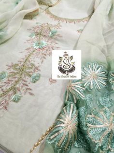 Item Overview ATHARVA Hand Embroidered Salwar Kameez w/Elegant Neck in Light Green(Pista) and w/ Chiffon Dupatta with Aari and Gota work jaal. CH1016 Dno. CH1016 Fabric:  * Shirt Chanderi in Light Green (Pista)  2.5 Mts, with jaal and Side Gota work * Dupatta: Pure Chiffon Dupatta in Pista w/Aari and Gota work 2.5Mts * Bottom Santoon Silk in (Pista) Light Green 2.5 Mts. Excusive Hand Embroidered Party Wear Punjabi Suit. Customization: * Fabrics: Designs Can be made in different Fabrics. * Stitch Pista Green Tissue Silk Kurta For Diwali, Cotton Silk Churidar For Wedding And Diwali, Pista Green Raw Silk Kurta With Resham Embroidery, Pista Green Chikankari Embroidered Cotton Silk Anarkali Set, Pista Green Raw Silk Anarkali Set With Chikankari Embroidery, Pista Green Raw Silk Anarkali Set With Chikankari, Pista Green Chikankari Anarkali Set In Raw Silk, Unstitched Pista Green Tissue Silk Kurta, Designer Cotton Silk Churidar With Zari Work