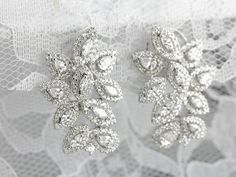 These vintage cocktail earrings are beautifully crafted, substantial and luxurious in style! Bright white gold forms a gleaming frame for the outstanding diamonds that form a glittering motif, sure to be an heirloom piece for years to come! Metal: 18K White Gold Gem: 326 Diamonds totaling totaling 4.55 Carats Earrings Length: 30 mm Earrings Width: 19 mm Cocktail Earrings, Diamond Cluster Earrings, Cocktail Jewelry, Cameo Ring, Vintage Cocktail, Diamond Anniversary, Jewelry Diamond, July Birthstone, Cluster Earrings