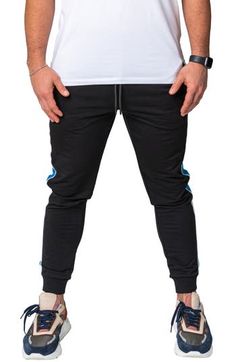 Athleisure is reinvented in these comfy joggers that leave others in the dust with supersoft fleece, bold side stripes and a skinny fit. Elastic/drawstring waist Front scoop pockets 92% cotton, 8% elastane Hand wash, dry flat Made in Turkey Sporty Relaxed Fit Sweatpants With Three Stripes, Relaxed Fit Three Stripes Sweatpants For Jogging, Relaxed Fit Athleisure Joggers With Three Stripes, Sporty Sweatpants With Side Stripes And Relaxed Fit, Black Cotton Joggers With Ribbed Cuffs, Sporty Relaxed Fit Sweatpants With Side Stripes, Blue Sporty Joggers With Ribbed Waistband, Relaxed Fit Joggers With Side Stripes For Jogging, Black Sweatpants With Ribbed Waistband