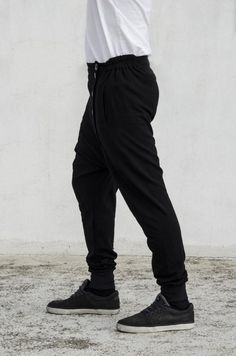 Panelled drop crotch joggers with 5 buttons offset closure & elastic waistband[] ENJOY FREE SHIPPING []> Place an order of 150€ minimum items’ value> Add coupon code VMFREESHIP at checkout> Benefit from free shipping[] EXTRA BENEFITS []> All orders above 25€ win a “Thank you” 10% discount coupon available for the next order> All orders receive special surprise gifts.[] GREEK CUSTOMERS []Buyers from Greece are advised to visit the official VOIDmode shop > (http://bit.ly/VOID Sporty Sweatpants With Tapered Leg, Urban Streetwear Bottoms With Ribbed Waistband, Sporty Tapered Leg Sweatpants With Loosely Fitted Hips, Sportswear Bottoms With Hip Pockets For Streetwear, Urban Bottoms With Ribbed Waistband For Streetwear, Sporty Loosely Fitted Tapered Leg Sweatpants, Sportswear Bottoms With Side Pockets For Streetwear, Sportswear Bottoms With Side Pockets, Casual Harem Pants With Elastic Waistband For Sports