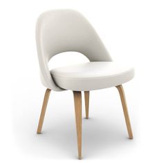 an upholstered white chair with wooden legs and a seat cushion on the back