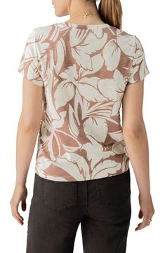 Jazz up your laid-back look with a cotton-first top covered in a groovy print. 24" length (size Medium) Crewneck Short sleeves 51% cotton, 49% rayon Machine wash, dry flat Imported Patterned Floral Print Cotton T-shirt, Cotton T-shirt With All Over Print For Vacation, Trendy Printed Cotton Tops, Floral Print Cotton T-shirt, Cotton T-shirt With Abstract Print In Relaxed Fit, Casual V-neck Top With All Over Print, Spring Casual T-shirt With Abstract Print, Casual Spring T-shirt With Abstract Print, Printed Cotton Crew Neck Top