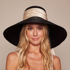 Black lacquered straw UPF 50+ protection wide-brim sunhat with ivory shiny satin ruched band and tails. UPF 50+ protection. CROWN: 4" / BRIM: 6.25" One Size. Eugenia Kim Web Exclusive. SKU: 21015-02124WE Elegant Short Brim Hat With Uv Protection, Elegant Brimmed Hat With Uv Protection, Elegant Spring Hats With Uv Protection, Elegant Spring Hat With Uv Protection, Elegant Brimmed Sun Hat With Uv Protection, Elegant Lined Hats For The Beach, Elegant Kentucky Derby Straw Hat For Vacation, Chic Evening Sun Hat For Kentucky Derby, Elegant Wide Brim Sun Hat With Uv Protection