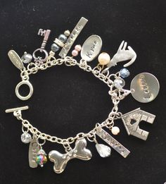 🏆 Bestseller! Tell YOUR story through charms. Each bracelet is custom made to order, personalized to your person and occasion. Unlike others, our bracelets are NOT mass produced and will not look like any other. Each bracelet comes with 10 total charms plus beads and bling to compliment your charms. (Additional charms may be added). This bracelet was made to showcase one's beloved dogs, Shayna, Leslie and Chloe. Truly a 'woman's best friends' ! 🌸Details: * 925 Sterling Silver, incredibly durab Customizable Silver Charms For Personalized Gift, Metal Charm Bracelets For Birthday, Customized Silver Bracelets For Birthday Gift, Customizable Silver Bracelets For Birthday Gift, Customized Silver Bracelet For Birthday, Silver Bracelet For Birthday Gift, Personalized Silver Charm Bracelet For Birthday, Personalized Silver Charm Bracelet Birthday Gift, Personalized Metal Charm Bracelet For Anniversary