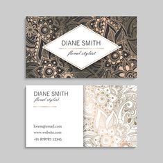 a business card with an elegant paisley pattern on the front and back, along with a name tag