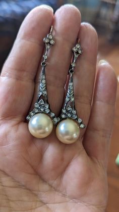 These earrings are so lovvely and classy.  They would be perfecty for a Bride! The earrings are over 2 1/2 inches long and the creamy faux pearls are 1/2 inch wide. The earrings are marked sil for silver. They are filled with tiny pastes in an Art Deco Style. In nice condition. Follow me on instagram@jettesjewels. Vintage Ysl, Deco Blue, Pearl Dangle Earrings, Snake Bracelet, Pearl Earrings Dangle, Art Deco Style, Natural Pearls, Deco Style, Beautiful Bracelet