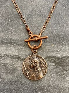 St. Joan of Arc Necklace Solid bronze chain and medal Bronze Medallion Necklace With Coin Pendant, Bronze Metal Necklace With Coin Pendant, Bronze Medallion Necklace With Adjustable Chain, Bronze Coin Pendant Medallion Necklace, Nickel-free Copper Medallion Necklace, Bronze Metal Medallion Necklace, Antique Copper Medallion Necklace, Antique Finish Copper Medallion Jewelry, Bronze Copper Medallion Jewelry