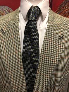 Following a buying trip earlier this year, we were lucky enough to find these exquisite vintage cravats, ties and bow ties. In this listing, we are selling this vintage blue and gold check silk  tie tie from Liberty's in London.   To find out more about this historic flagship department store, click the link here https://en.m.wikipedia.org/wiki/Liberty_(department_store) This is an elegant piece of neckwear and the perfect present for the designer prints lover in your family. Super smart for the Classic Multicolor Office Ties, Classic Multicolor Suit And Tie Accessories For Business, Vintage Black Tie Standard Tie, Vintage Ties For Black Tie Events, Vintage Business Ties, Classic Multicolor Neckwear For Black Tie, Vintage Brown Ties For Formal Occasions, Vintage Black Tie Accessories, Vintage Suit And Tie Accessories For Black Tie