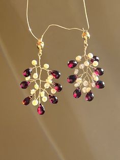 This Dangle & Drop Earrings item is sold by Essenziale. Ships from Spain. Listed on 20 Jan, 2023 Twig Earrings, Garnet And Pearl, Branch Earrings, Gold Vermeil Jewelry, January Birthstone, Garnet Earrings, Vermeil Jewelry, Wrapped Jewelry