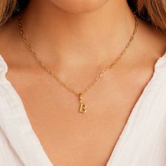 Description Personalize your favorite chain necklace with this playful helium alphabet charm. Wear your initials or a loved one's - you can make a set here. Product Details Total drop 11/16" Letter measures 5/16" by 3/8" Hinge closure measures 3/16" by 5/16" Available in 18k gold plated brass Avoid contact with anything containing derivatives of alcohol White Aura, Earrings Stacking, Abbot Kinney, Alphabet Charm, Black Labradorite, Orange Agate, Yellow Opal, Snowflake Obsidian, Mix Style