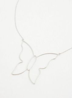 A butterfly-shaped charm shimmers on a silver chain to give this delicate necklace an eye-catching look. Lobster clasp. 19” length and 5” extender. Man-made materials. Imported. The best plus size women's silver-tone butterfly wire necklace necklaces in silver. Torrid is your destination for the freshest spring and summer styles. Wire Necklace, Summer Styles, Delicate Necklace, Lobster Clasp, Silver Chain, Silver Tone, Jewelry Necklaces, Necklaces, Chain