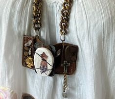 28 inch. Vintage worn leather base with original rivets and seams. I made a clay pendant with charming image and wire wrapped it as centerpiece. Accented with bits and bobs . Suspended from beatup , upcycled chains. Stunner! Rocker Chick, Boho Pendant, Found Object, Squirrels, Vintage Wear, Diy Jewelry Making, Rivets, Vintage Leather, Assemblage