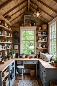 a kitchen with wooden walls and shelves filled with plants