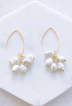 A beautiful pair of Keishi Pearl dangling earrings made on 24k Gold Plated Sterling Silver fish hooks. They are unique and the ideal gift for anyone. The size of each pearl is ~6-8mm and note that as they are real pearls they may have natural markings and indentations. The drop size is approx 5cm They come beautifully gift wrapped 💖 Cluster Bracelets, Fish Hooks, Silver Fish, Birthstone Earrings, Pearl Cluster, Earrings Pearl, June Birthstone, Real Pearls, Birthstone Earring