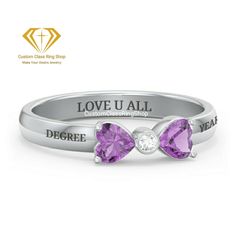 Personalized College Graduation Ring, Custom Class ring, Custom Class Ring for woman | Graduation Ring semi-fine jewelry ✥ 𝐌𝐚𝐢𝐧 𝐒𝐭𝐨𝐧𝐞 𝐃𝐞𝐭𝐚𝐢𝐥𝐬 ↣ Shape: heart and round shape cut ↣ Making Process: Handmade - Crafted by our experienced team ✥ 𝐑𝐢𝐧𝐠 𝐃𝐞𝐭𝐚𝐢𝐥𝐬 ↣ Metal Purity: Solid Gold (10KT, 14KT, 18KT); Silver (925 Sterling, 935 Argentium), 950 Platinum ↣ Metal Tone: Yellow, White, Rose ↣ Stamp/Hallmark: Yes ❃ 𝐒𝐩𝐞𝐜𝐢𝐚𝐥𝐭𝐲 𝐚𝐧𝐝 𝐍𝐨𝐭𝐞𝐬 ↣ Customized Designer Jewelry. ↣ Updating every step of your ordered jewelry. ↣ All listed jewelry in our stores is made to order. ↣ Make jewelry and stone when order placed as all are handmade customization items, so we didn't have in stock. ↣ Listed items images are taken in 12US ring size CAD. ↣ If you order it, we can mak Silver Ring For Formal Occasions And Mother's Day, Elegant Personalized White Rings, Silver Ring For Formal Occasions On Mother's Day, White Gold Diamond Couple Rings As Gift, Personalized Diamond Stackable Rings For Anniversary, Customizable Diamond Promise Ring, Customizable Elegant Diamond Rings, White Engraved Ring As Fine Jewelry Gift, Elegant Personalized Engraved Cubic Zirconia Ring